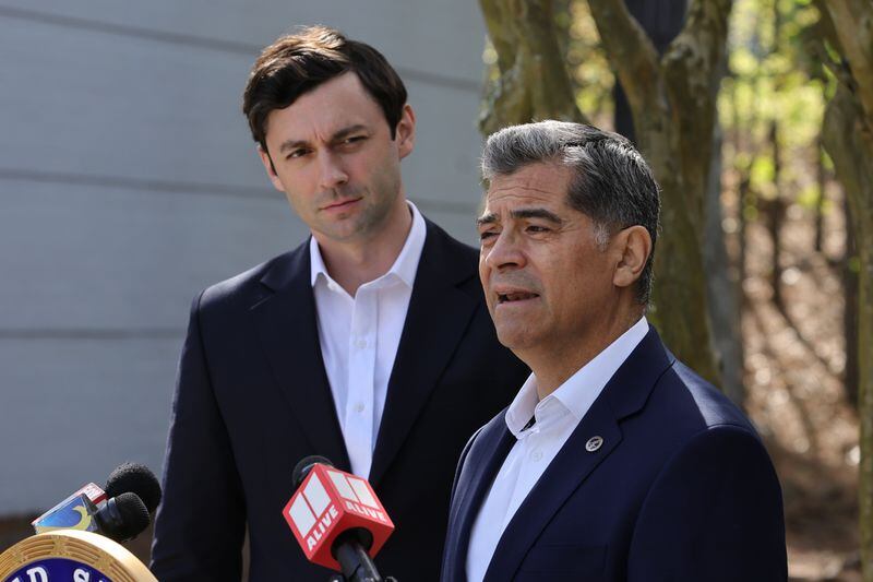 Secretary of Department of Health and Human Services Xavier Becerra speaks as Sen. Jon Ossoff looks on during a press conference at Ser Familia in Norcross on Monday, April 10, 2023. (Natrice Miller/The Atlanta Journal-Constitution)