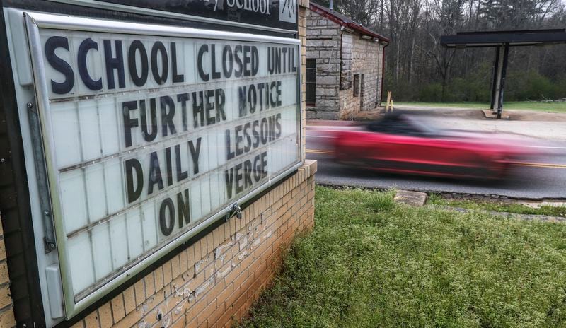 A sign says it all to passing motorists at Murphey Candler Elementary School at 6775 S Goddard Road in Lithonia, DeKalb County on Wednesday, March 18, 2020.  JOHN SPINK/JSPINK@AJC.COM