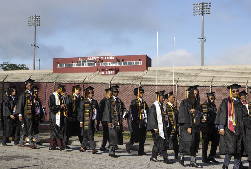 Members of the Morehouse College Class of 2023 walk toward Century Campus during the Morehouse College commencement ceremony on Sunday, May 21, 2023, in Atlanta. The graduation marked Morehouse College's 139th commencement program. (Christina Matacotta for The Atlanta Journal-Constitution)