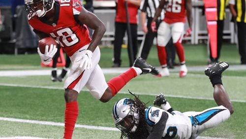 Falcons wide receiver Calvin Ridley scores his first NFL touchdown during Sunday's game against the Panthers. (Curtis Compton/ccompton@ajc.com).