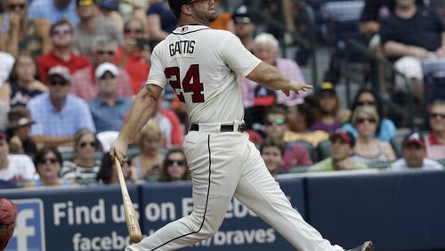 Atlanta Braves Evan Gattis bats against the Cincinnati Reds in a baseball game Sunday, July 14, 2013 in Atlanta. (AP Photo/John Bazemore) The Braves will have to to make do for a while without Evan Gattis, who led the team in June in average, OBP, slugging percentage, homers and RBIs.