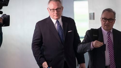 Michael Caputo, left, joined by his attorney Dennis C. Vacco, leaves after being interviewed by Senate Intelligence Committee staff investigating Russian meddling in the 2016 presidential election, on Capitol Hill in Washington. A House subcommittee examining President Donald Trump’s response to the coronavirus pandemic is launching an investigation into reports that political appointees have meddled with routine government scientific data to better align with Trump’s public statements.