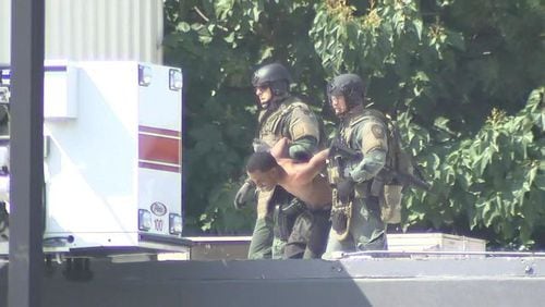 Officers took a man into custody after a SWAT situation Saturday in Brookhaven.