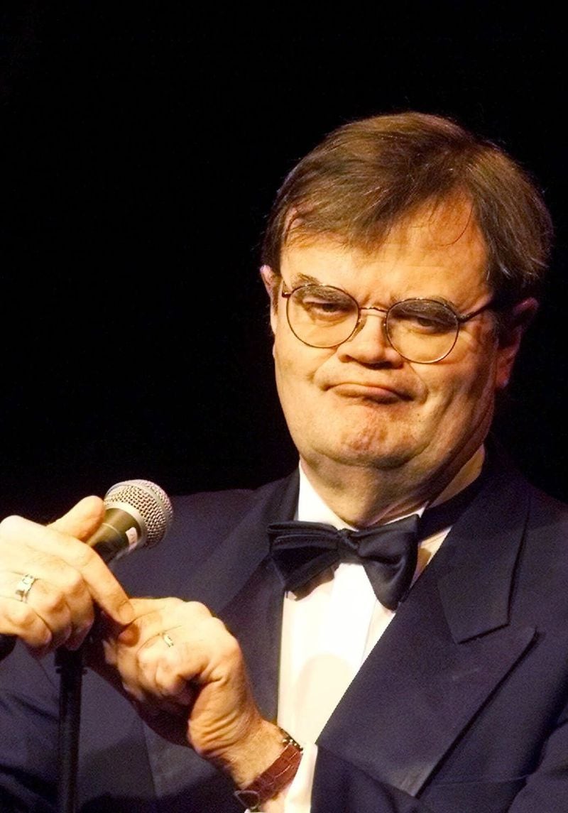 Garrison Keillor is shown during his radio show "A Prairie Home Companion" in the Wuehlmaeuse Theatre in Berlin, in this March 3, 2001, file photo. Many of his novels are set in his fictional hometown of Lake Wobegon, The Gateway to Central Minnesota. 