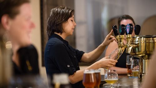 110616 NS beverage9  Olivia Morales, head of marketing, pours a beer for a visitor to the Abbey of the Holy Goats brewery Saturday, Aug. 20, 2016. Photo by Bita Honarvar/Special