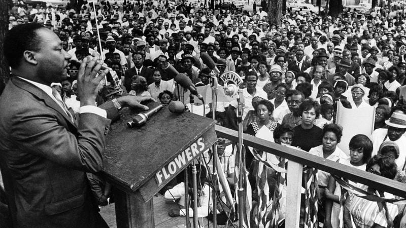 In this April 30, 1966 photo, The Rev. Martin Luther King Jr. addresses a crowd of some 3,000 persons in Birmingham, Ala., in Kelly Ingram Park on the last day of his three-day whistle-stop tour of Alabama, encouraging black voters to vote as a bloc in the primary election. President Barack Obama signed an order Thursday, Jan. 12, 2017, designating an historic civil rights district in Birmingham as a national monument, placing several blocks of a city once rocked by racial violence on par with landmarks including the Grand Canyon. (AP Photo/JT, File)