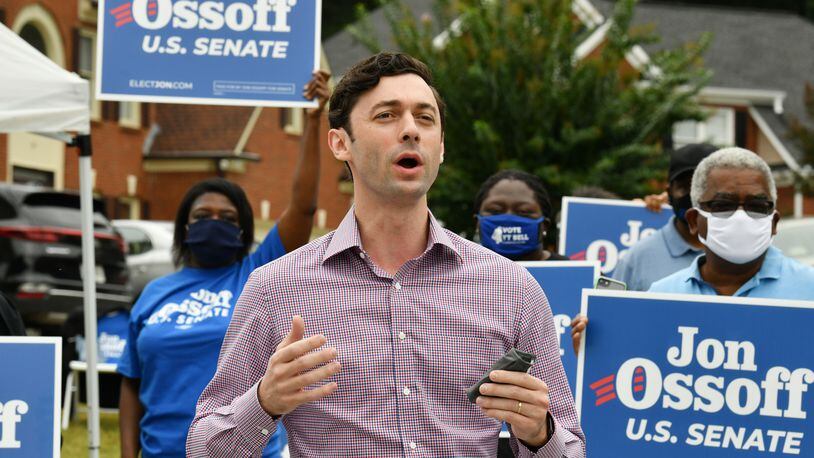 September 26, 2020 Stone Mountain - U.S. Senate candidate Jon Ossoff speaks to his supporters prior to a drive-thru, socially distanced, yard-sign pickup event hosted by the Georgia Federation of Democratic Women and the DeKalb Democratic Women’s groups in Stone Mountain on Saturday, September 26, 2020. Hyosub Shin / Hyosub.Shin@ajc.com)
