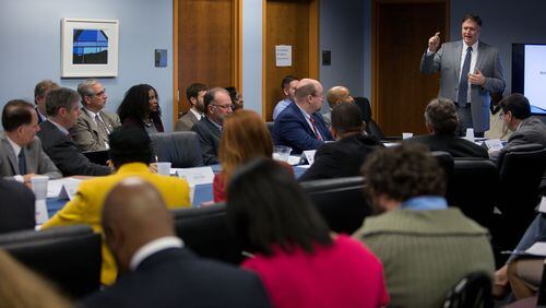 Fulton County Chief Operating Officer Todd Long talks during a county meeting at the Fulton County Government Center, Monday, Dec. 14, 2015, in Atlanta.  Mayors and other representatives of Fulton County's 14 cities met to discuss a possible TSPLOST for next year.  BRANDEN CAMP/SPECIAL