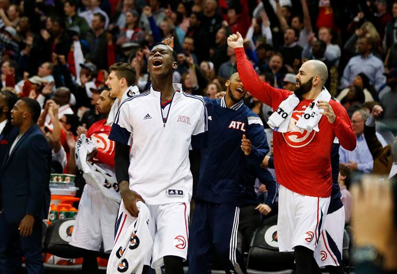 Atlanta Hawks guard Dennis Schroder, front, reacts after an Atlanta basket late in the second half of an NBA basketball game against the Portland Trail Blazers on Friday, Jan. 30, 2015, in Atlanta. Atlanta won 105-99 and stretched its winning streak to 18. (AP Photo/John Bazemore) Dennis Schroder changed the game, then exulted in its outcome. (John Bazemore/AP photo)