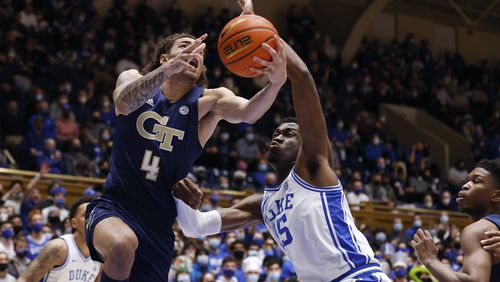 Georgia Tech's Jordan Usher (4) drives against Duke's Mark Williams (15) during the first half at Cameron Indoor Stadium on Tuesday, Jan. 4, 2022, in Durham, North Carolina. (Grant Halverson/Getty Images/TNS)