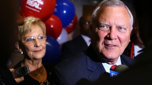 Gov. Nathan Deal and Georgia First Lady Sandra Deal arrive at the Georgia Republican Party Election Night Victory Party in the College Football Hall of Fame on election night. Deal will attempt fixes to the state’s educational funding formula, ethics commission and criminal justice system in his second term. CURTIS COMPTON / CCOMPTON@AJC.COM