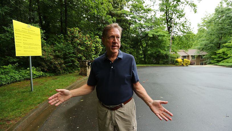 Michael Hartley’s neighbor is trying to sell his home on a cul-de-sac, where a developer hopes to add around 20 new homes. Curtis Compton/ccompton@ajc.com AJC FILE PHOTO
