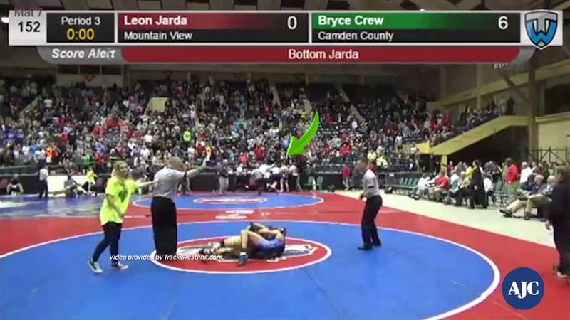 Here's a still from a video showing Osborne High's Chanceller Jones charging Pope High's Jordan Conley after losing to him. Video from the  Feb. 11, 2017, match in Macon is from Trackwrestling.com.