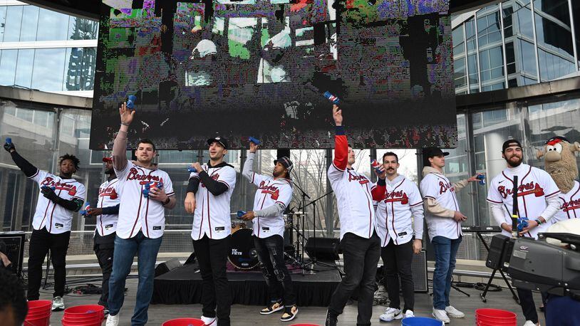 Atlanta Braves’ players throw free T-shirts during Braves Fest at The Battery Atlanta, Saturday, Jan. 21, 2023, in Atlanta. (Hyosub Shin / Hyosub.Shin@ajc.com)