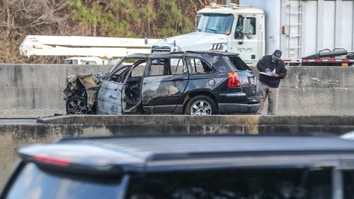 A fatal multivehicle crash on I-285 in Clayton County caused major delays for motorists Wednesday morning. At least one vehicle went up in flames. (John Spink / john.spink@ajc.com)