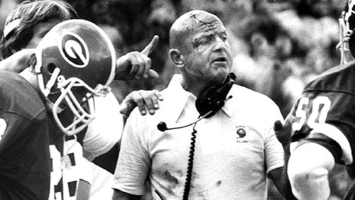 As a longtime UGA defensive coordinator, an Erk Russell trademark was to butt heads with his players, even if it meant a bloodied forehead. (Billy Downs /AJC file)