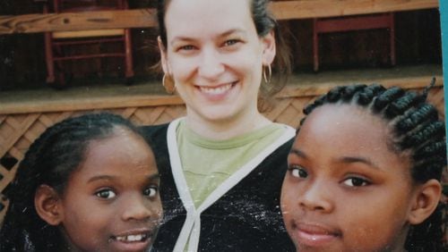 Volunteer tutor Patti Ghezzi with Whitefoord Elementary School students in 2000 at Camp Woodmont in North Georgia. Volunteers raised money in memory of Dr. Betty Blasingame to send children to camp.
