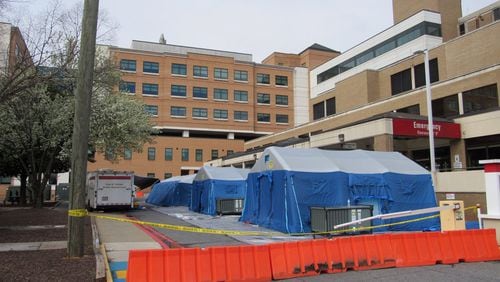 Tents are set up behind Wellstar Kennestone Hospital in Marietta. Photos: Jennifer Brett, jbrett@ajc.com