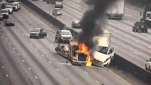 A Villa Rica trucker faces DUI and reckless driving charges following a fiery crash Tuesday afternoon on I-285 in DeKalb County.