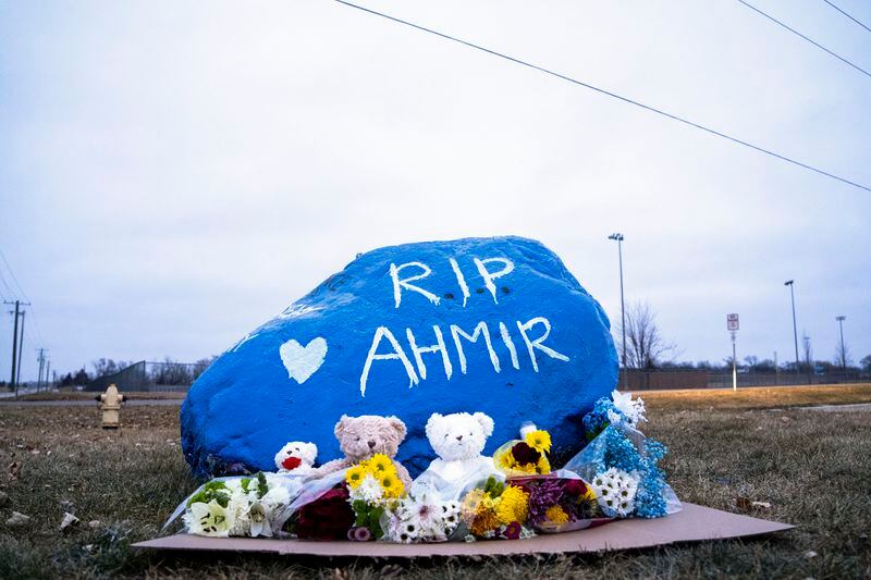 FILE - A rock is painted to memorialize Perry High School shooting victim Ahmir Jolliff at the school, Jan. 6, 2024, in Perry, Iowa. Iowa's Republican-led Legislature passed a bill this week allowing teachers and staff who undergo training to get permits to carry guns on school property. That comes three months after a fatal shooting at the Iowa school. (Lily Smith/The Des Moines Register via AP, File)