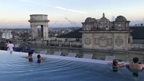 The rooftop pool of the new Gran Hotel Manzana Kempinski, which opened last summer, overlooks Havana. The hotel landed on the U.S. government’s list of banned businesses in November, but Backroads customers are allowed to stay here because the company booked the rooms before the list came out. (Lori Rackl/Chicago Tribune/TNS)