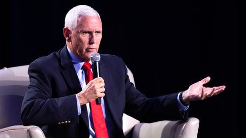 Former vice president and Republican presidential candidate Mike Pence speaks to WSB radio host Erick Erickson at The Gathering conservative political conference in Buckhead on Friday, August 18, 2023. (Arvin Temkar / arvin.temkar@ajc.com)