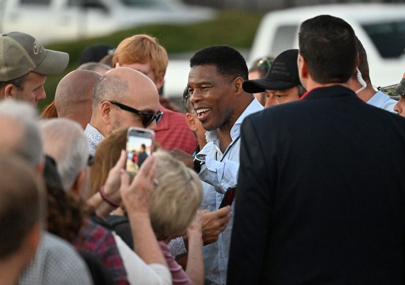 Republican U.S. Senate hopeful Herschel Walker's campaign took on new life after his debate with Democratic U.S. Sen. Raphael Warnock, and stepped up attacks, calling his opponent a "Marxist" and "wolf in sheep's clothing." (Hyosub Shin / Hyosub.Shin@ajc.com)