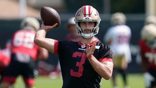 San Francisco 49ers quarterback Josh Rosen throws a pass at NFL football training camp in Santa Clara, Calif., Thursday, July 29, 2021. (AP Photo/Jeff Chiu)