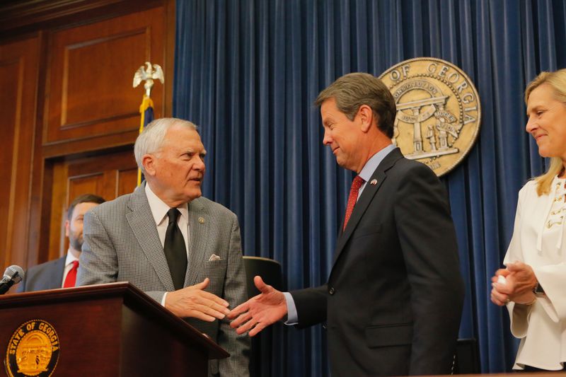 Gov. Brian Kemp, right, has not staked out a defining “legacy” agenda along the lines of his immediate predecessor, Nathan Deal, who embarked on an eight-year overhaul of Georgia's criminal justice system. Kemp did set out a general goal, though, for his second term. “Over the next four years, we’re going to be focused on growing Georgia,” he told a crowd of hundreds at the newly built Georgia State Convocation Center during his inaugural address. “Not growing government.”