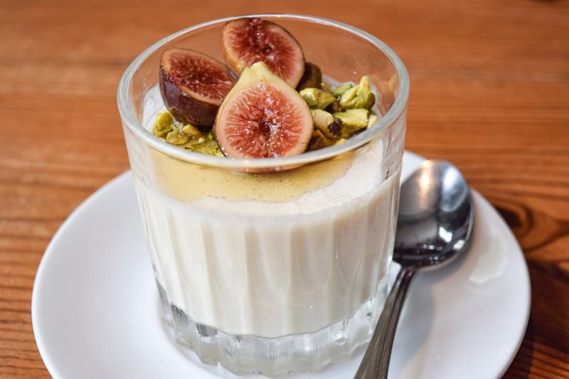 Leon’s Full Service Honey Panna Cotta, which is garnished here with fresh figs and chopped pistachios. CONTRIBUTED BY TORI ALLEN PR / STYLING BY RACHEL WRIGHT