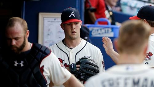 Alex Wood (center) allowed five hits and and zero runs, while striking out 12 in 8 innings of work Sunday, Aug. 31, 2014, against the Miami Marlins at Turner Field in Atlanta.