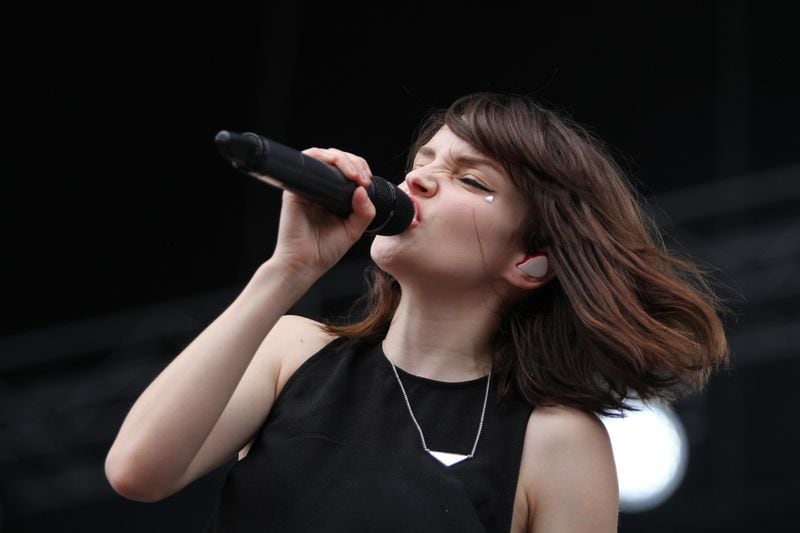 Glasgow band Chvrches Lauren Mayberry performing at Music Midtown festival Saturday. (Akili-Casundria Ramsess/Special to the AJC)