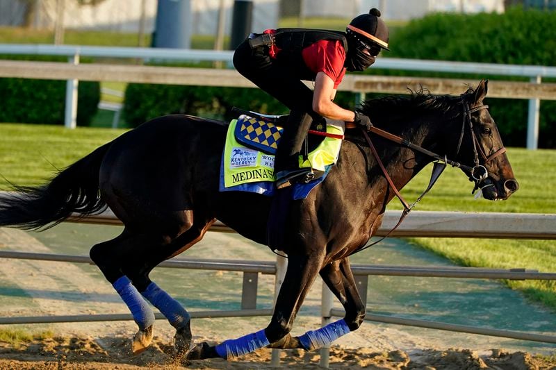 Kentucky Derby hopeful Medina Spirit works out at Churchill Downs Tuesday, April 27, 2021, in Louisville, Ky. The 147th running of the Kentucky Derby is scheduled for Saturday, May 1. (Charlie Riedel/AP)