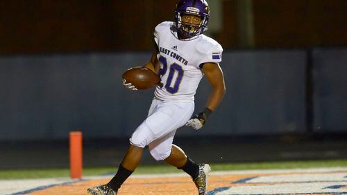 East Coweta running back Jayden Bolton (20) hits the back of the end zone to score a touchdown during a 2019 game at North Cobb. (Daniel Varnado/Special)
