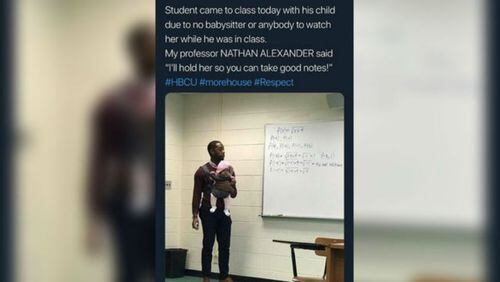 Morehouse College professor Nathan Alexander held a student's infant who was unable to find a sitter. (Photo: WSBTV.com)