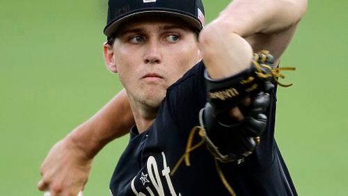 FILE - In this June 4, 2016, file photo, Vanderbilt starter Kyle Wright pitches against Washington in the first inning of an NCAA college baseball regional tournament game, in Nashville, Tenn. (AP Photo/Mark Humphrey, File)