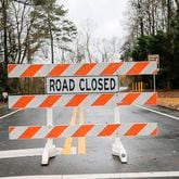 A road closure sign deters drivers from traveling along flooded Azalea Road in Roswell, Friday, December 28, 2018, in this AJC file photo. South Cobb Drive in Marietta will close for two months while the Georgia Department of Transportation replaces a large, failing drainage pipe, starting Tuesday, March 19, 2024. (ALYSSA POINTER/ALYSSA.POINTER@AJC.COM)