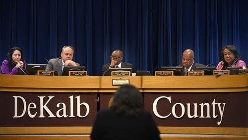 The DeKalb Commission voted Tuesday to hire John Greene as the county government’s financial watchdog. From left: Commissioners Nancy Jester, Jeff Rader, Larry Johnson, Stan Watson and Sharon Barnes Sutton. HYOSUB SHIN / HSHIN@AJC.COM