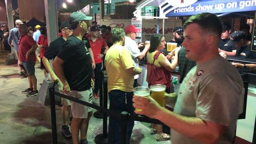 Georgia fans dominated the long lines for beer sales in the southside concourse of Vanderbilt Stadium Saturday, Aug. 31, 2019, in Nashville.