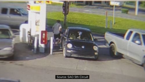 Eric Gay pumping gas in car belonging to woman he's accused of killing (SAO 5th Circuit via WFTV.com)