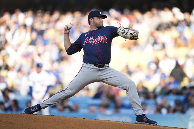 Atlanta Braves starting pitcher Bryce Elder throws during the first inning of a baseball game against the Los Angeles Dodgers in Los Angeles, Saturday, May 4, 2024. (AP Photo/Ashley Landis)