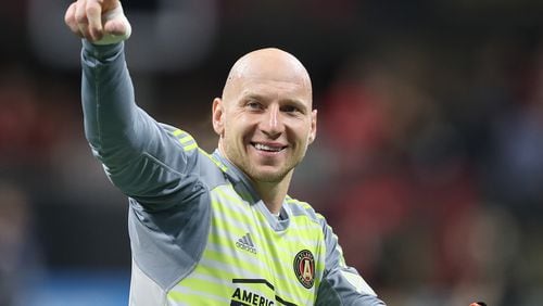 Atlanta United goalkeeper Brad Guzan celebrates a 3-1 victory over D.C. United during the home opener in a MLS soccer match on Sunday, March 11, 2018, in Atlanta.    Curtis Compton/ccompton@ajc.com