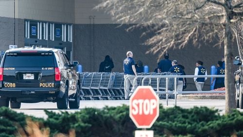A Wal-Mart in north Cobb County was evacuated Tuesday because of a bomb threat. JOHN SPINK / JSPINK@AJC.COM