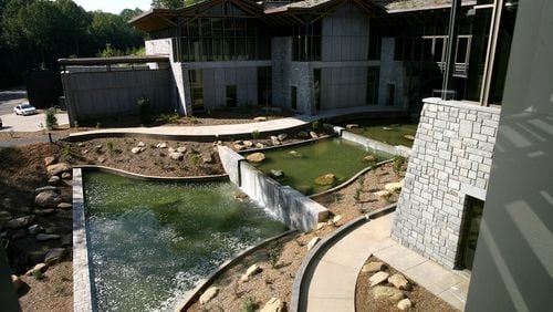 The Gwinnett Environmental and Heritage Center is shown with recycled water running through the middle.