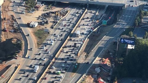 The new GA-400/southbound exit ramp to I-285/eastbound opened last Monday next to Hammond Drive. The new positioning confused some motorists. Credit: Doug Turnbull, WSB Skycopter