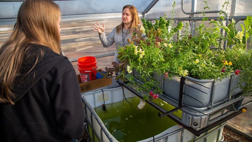 Cornerstone Preparatory Academy teacher Terri Haas (right, CQ) talks to her students about the school's Hydroponic garden at the Acworth campus on January 25th, 2019. For AJC Top Workplaces story. (Photo by Phil Skinner)