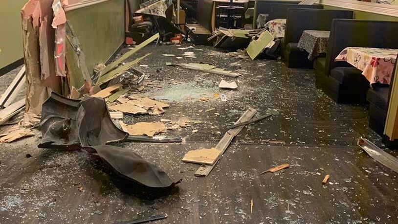A car smashed through the Chicken Salad Chick restaurant in Vinings Saturday night, according to the eatery’s Facebook page.