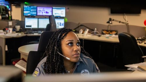 Dispatch operator Kelah Handley answers calls at a Sandy Springs 911 call center on Wednesday, April 17, 2019. STEVE SCHAEFER / SPECIAL TO THE AJC