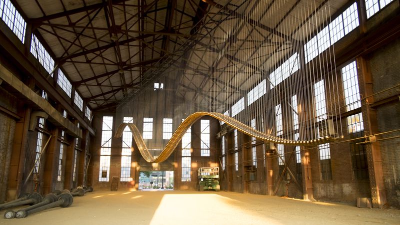 “Bridge,” a 100-foot long sculpture, is part of the With Drawn Arms exhibit.