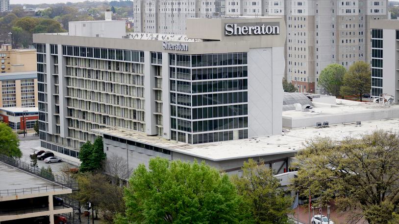 Joining a growing list of downtown properties under financial duress, the Sheraton Atlanta Hotel, with its 763 rooms, is facing the likelihood of foreclosure due to mounting unpaid commitments by its owner Arden Group.Miguel Martinez /miguel.martinezjimenez@ajc.com